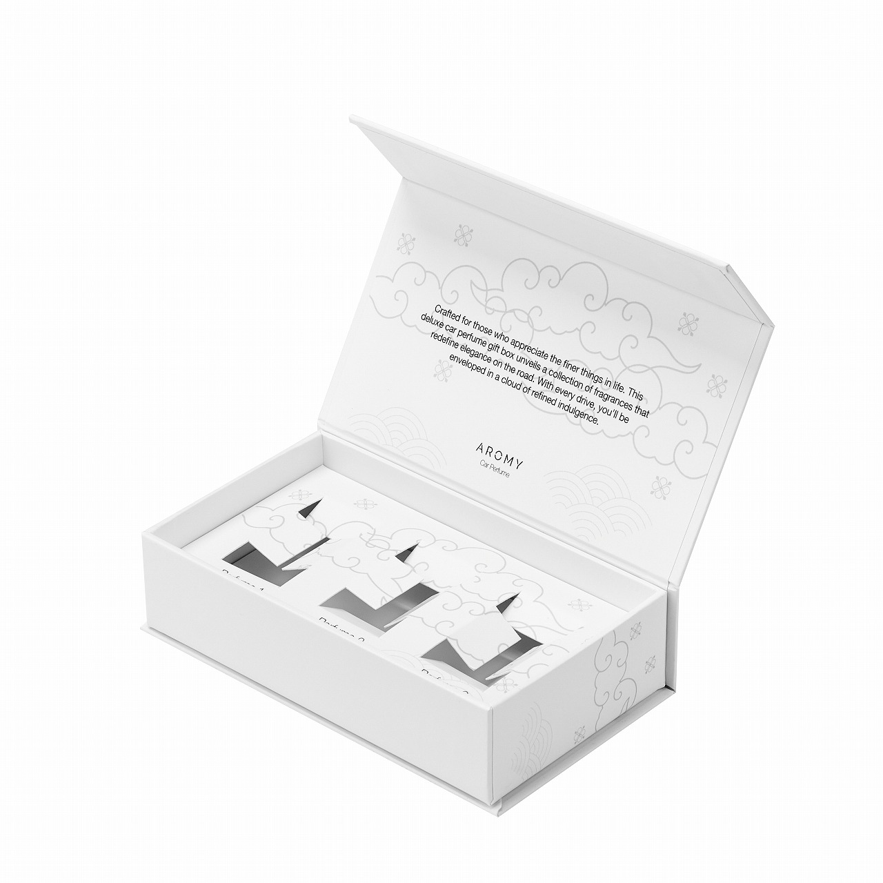 White custom magnetic perfume box open showing rigid book-style flap and minimalist cloud patterns