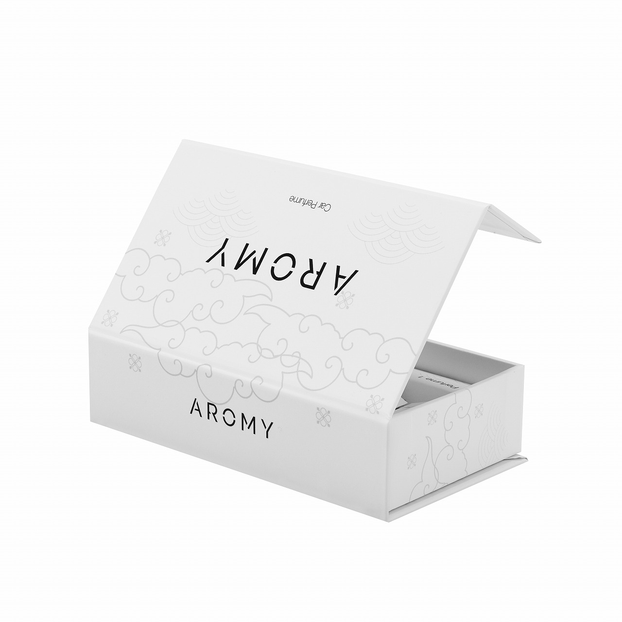 Empty white die-cut paper insert tray for car perfume glass vials inside a rigid box