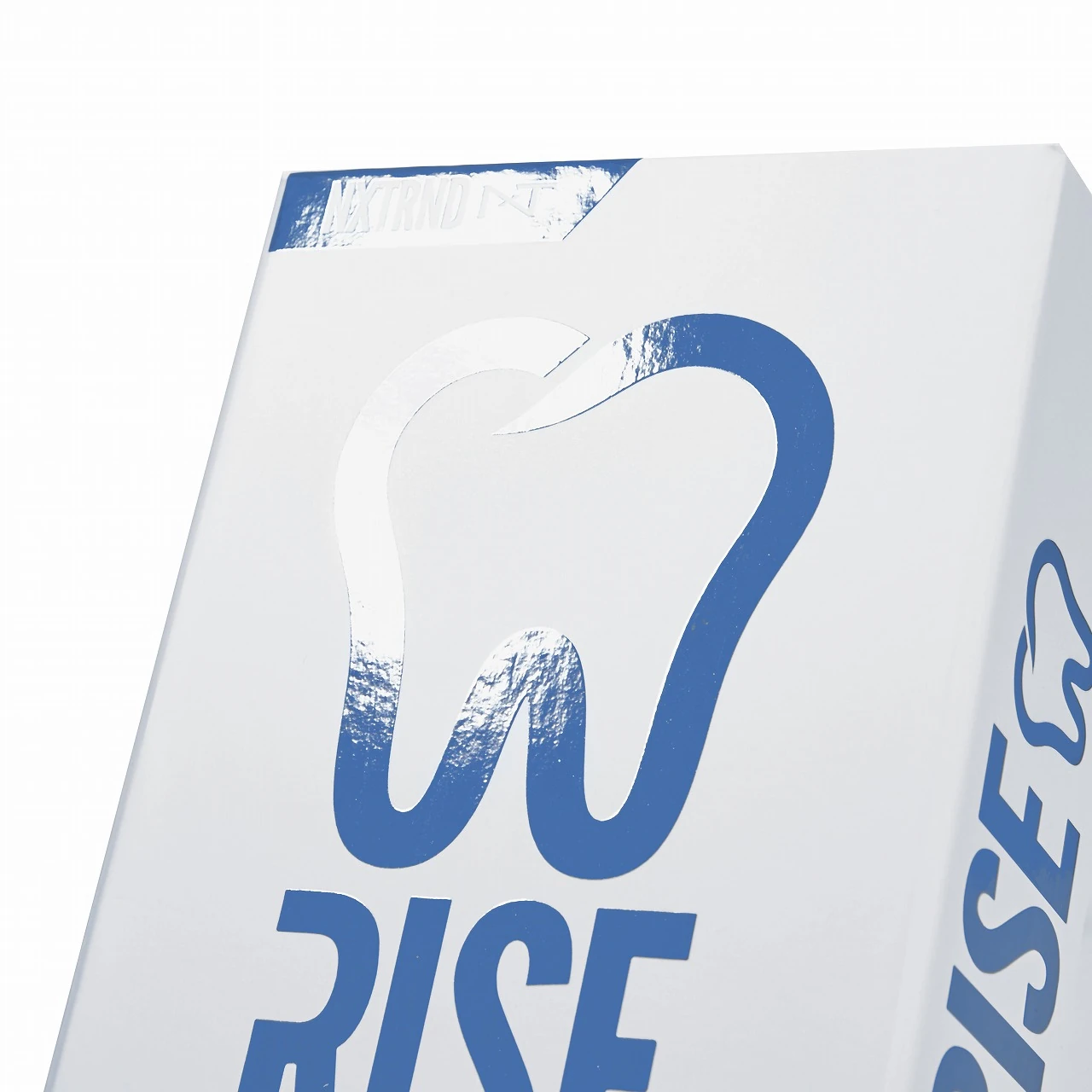 Close-up of the blue tooth graphic and reflective surface detail on a night guard box