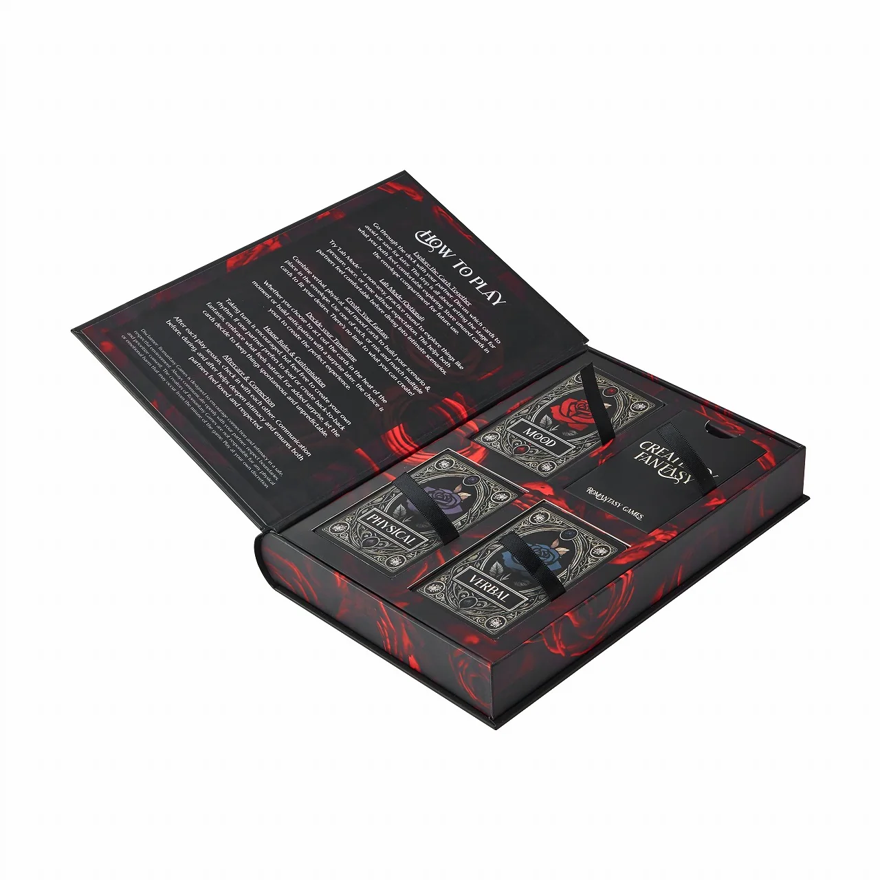 Open hinged book-style rigid game box showing fitted deck compartments and ribbon pull-tabs